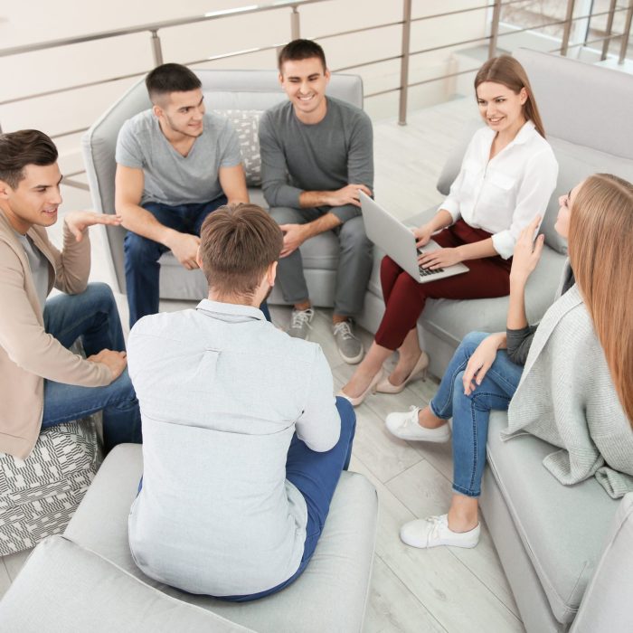 Therapist working with her group during session